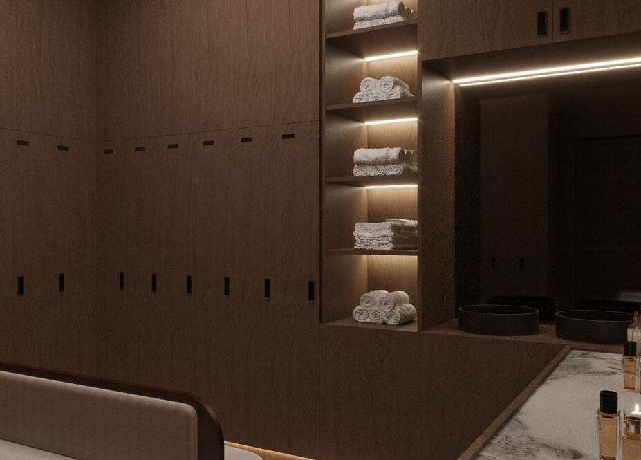 Elegant interior of Him Spa in Riyadh, Riyadh Province, SA, featuring shelves with towels and aromatic oils.