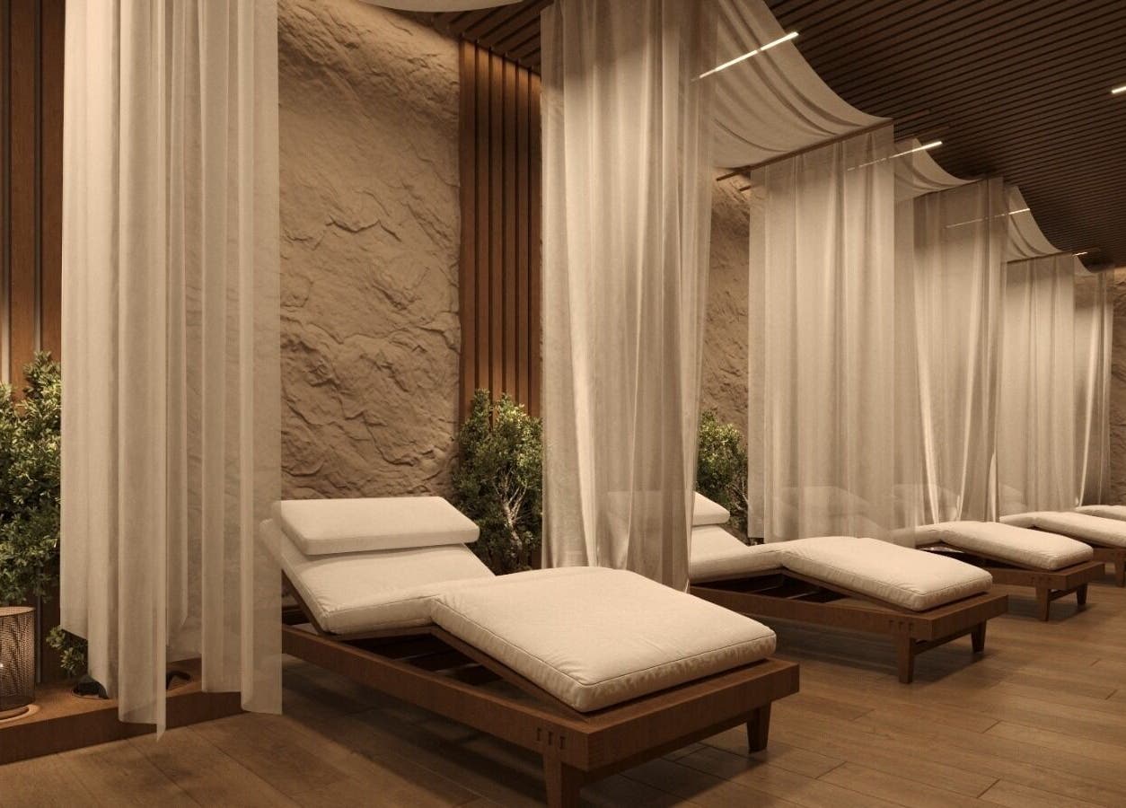 Relaxing lounge area at Him Spa, Riyadh, Riyadh Province, SA with cozy loungers and soft lighting.