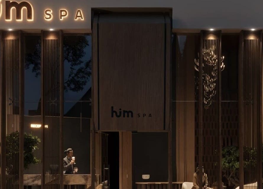 Elegant nighttime Him Spa entrance in Riyadh, Riyadh Province, SA, showcasing modern design and warm lighting.