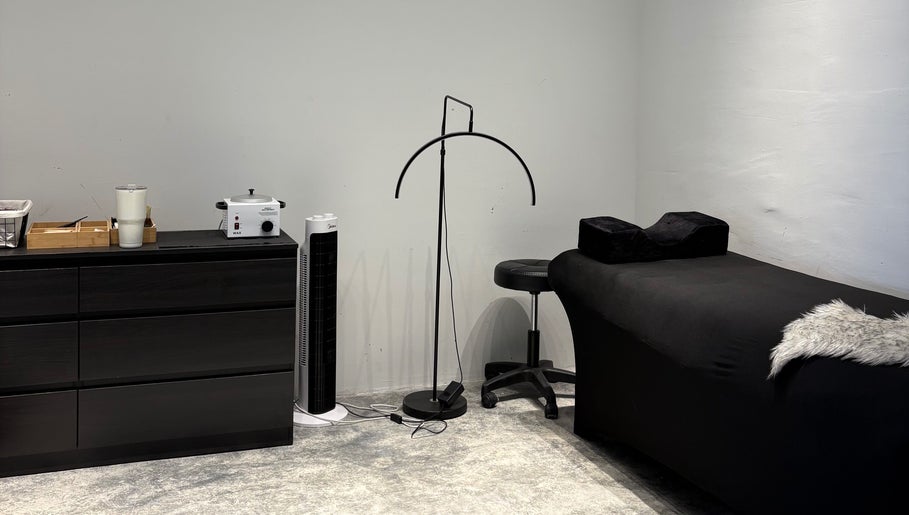 Modern treatment room at ECHATHESTUDIO, Telok Panglima Garang, Selangor, MY with sleek decor and comfortable seating.