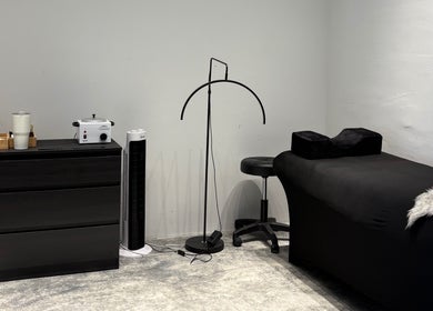 Modern treatment room at ECHATHESTUDIO, Telok Panglima Garang, Selangor, MY with sleek decor and comfortable seating.