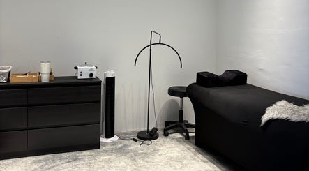 Modern treatment room at ECHATHESTUDIO, Telok Panglima Garang, Selangor, MY with sleek decor and comfortable seating.