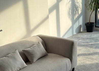 Cozy sofa in sunlit corner at ECHATHESTUDIO, Telok Panglima Garang, Selangor, MY.