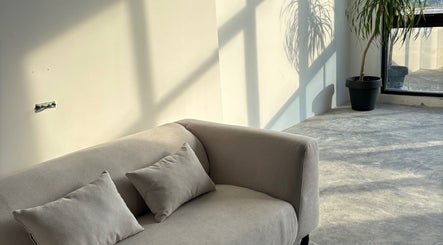 Cozy sofa in sunlit corner at ECHATHESTUDIO, Telok Panglima Garang, Selangor, MY.