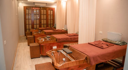 Elegant massage tables at Lá Spa - Massage Shampoo Hanoi, Hà Nội, VN, offering a tranquil relaxation space.