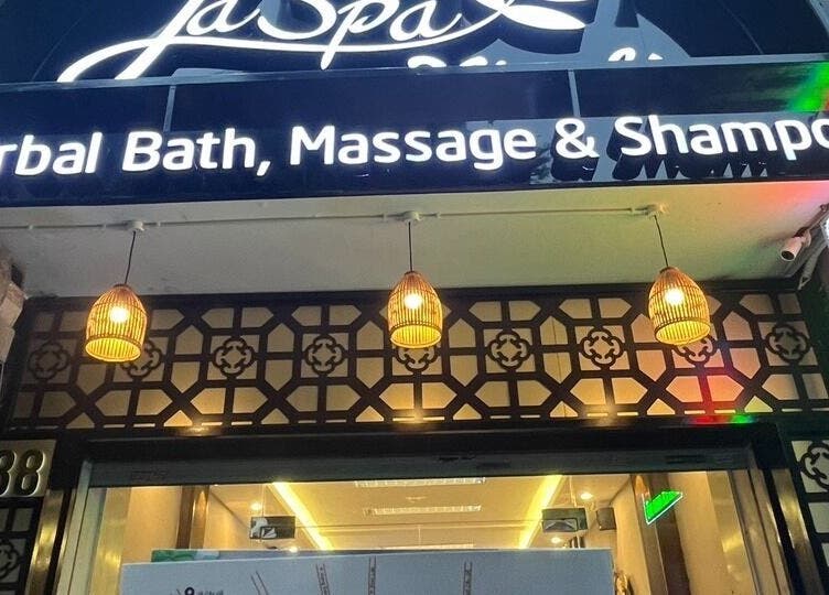 Front of Lá Spa 38- Massage Shampoo Hanoi in Hà Nội, VN, featuring elegant design and warm lighting.