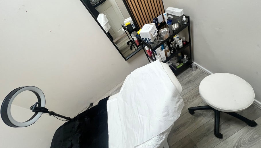 Treatment room at 7blessingsbeauty, Liverpool, England, GB, showcasing a serene setup with modern equipment.