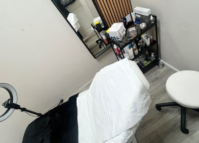 Treatment room at 7blessingsbeauty, Liverpool, England, GB, showcasing a serene setup with modern equipment.