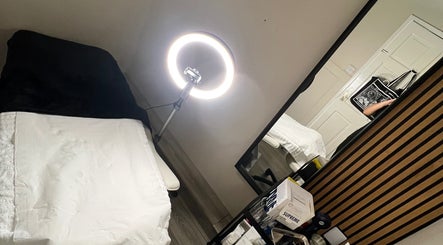 Serene beauty treatment room at 7blessingsbeauty, Liverpool, England, GB with soothing lighting and professional setup.