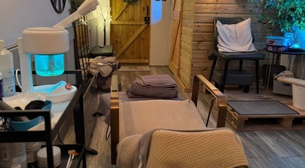 Relaxing wellness setup at Bow-tiful in Hoyland, England, GB featuring spa chairs and soft lighting.