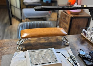 Professional manicure station at Bow-tiful, Hoyland, England, GB, featuring elegant setup and equipment.