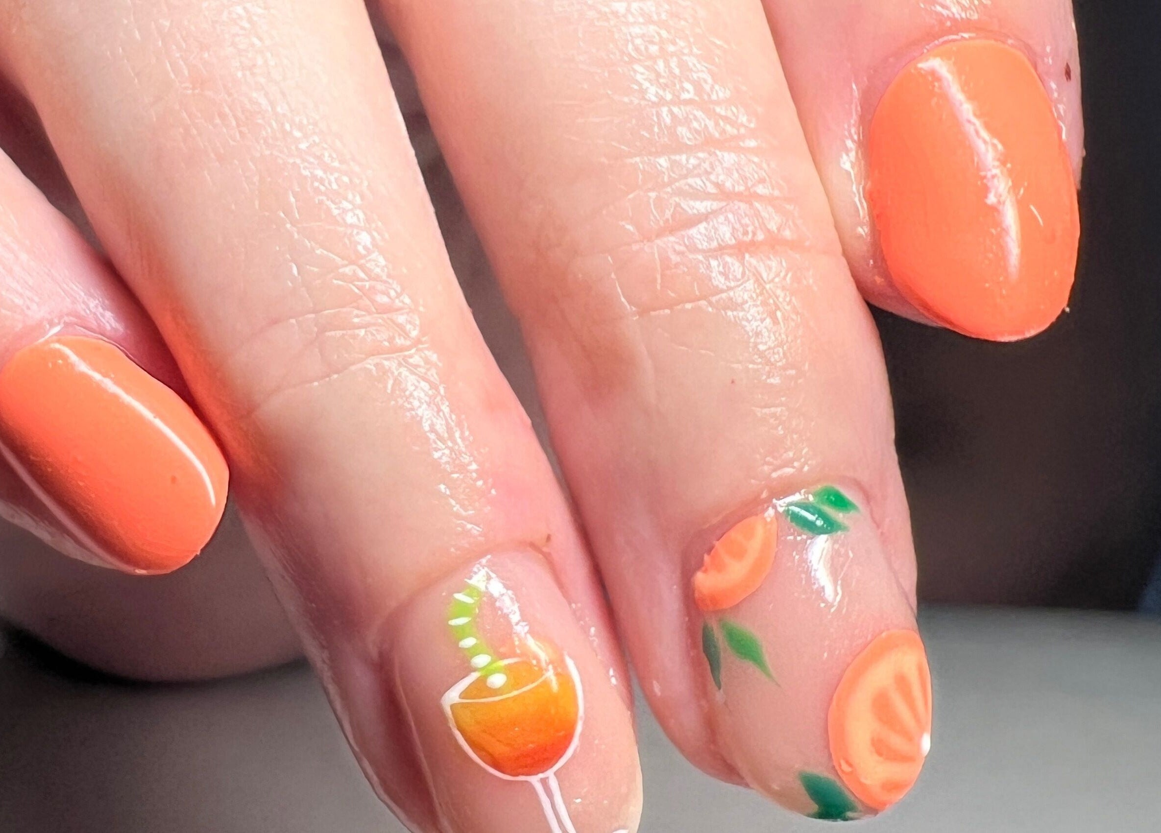 Bright orange nail art at Aurora Beauty by Drea, San Pawl il-Baħar, MT featuring citrus designs.