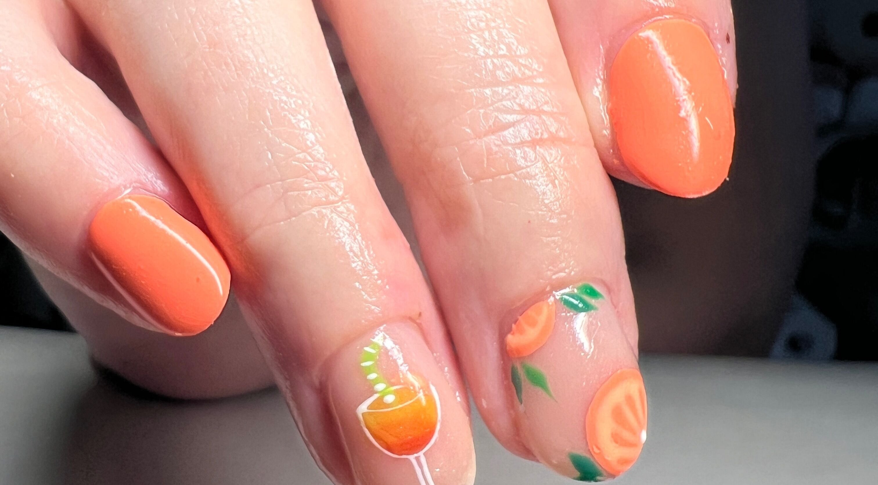 Bright orange nail art at Aurora Beauty by Drea, San Pawl il-Baħar, MT featuring citrus designs.