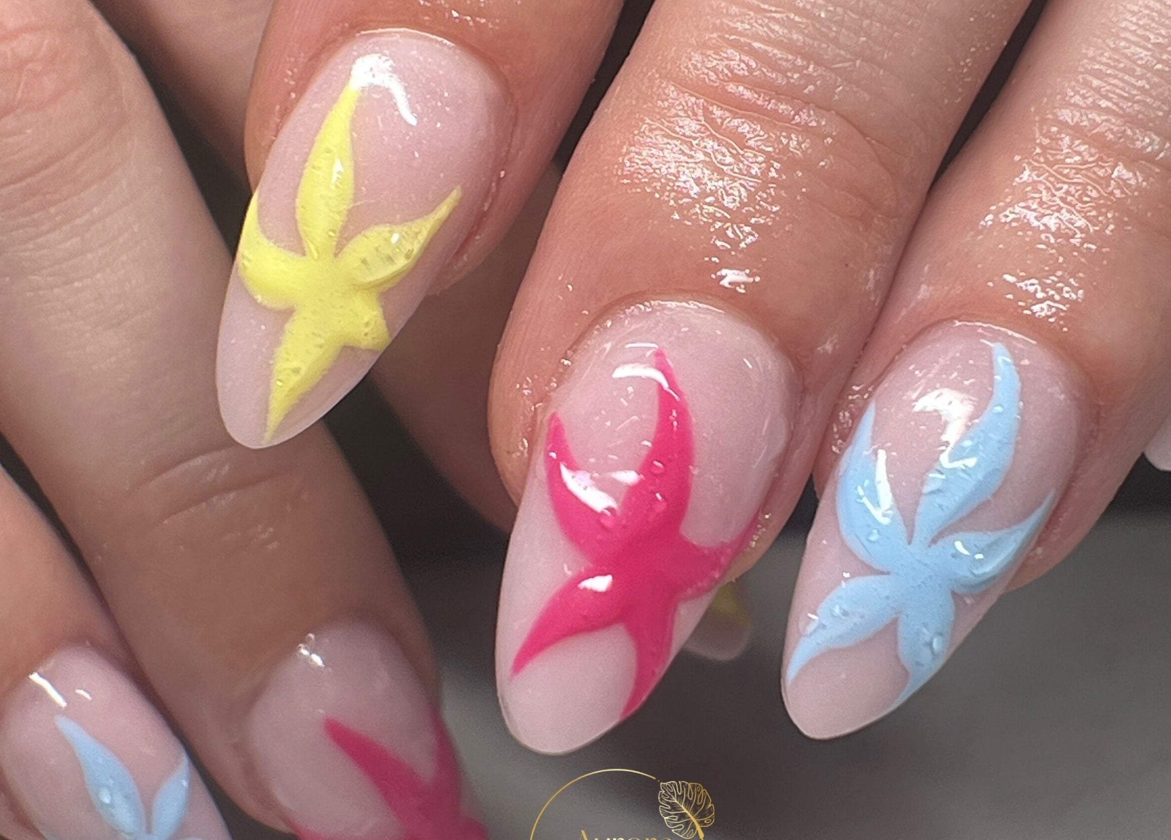 Vibrant floral nail art at Aurora Beauty by Drea in San Pawl il-Baħar, MT.