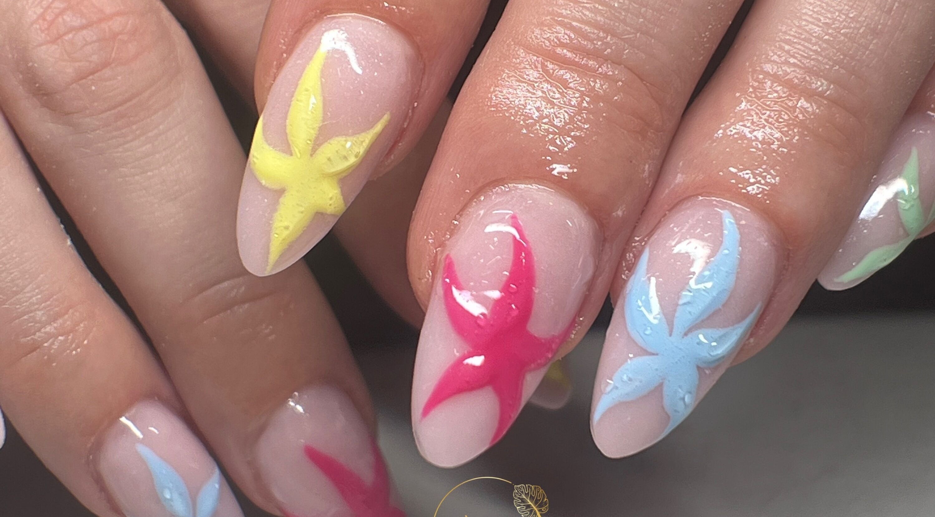 Vibrant floral nail art at Aurora Beauty by Drea in San Pawl il-Baħar, MT.