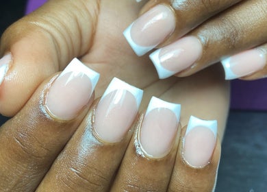 French manicure at Buffed246, Lancaster, Saint James, BB showcasing elegant nail art.