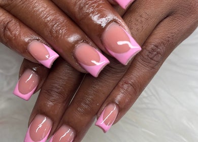 Elegant pink French manicure at Buffed246 in Lancaster, Saint James, BB showcasing expert nail artistry.