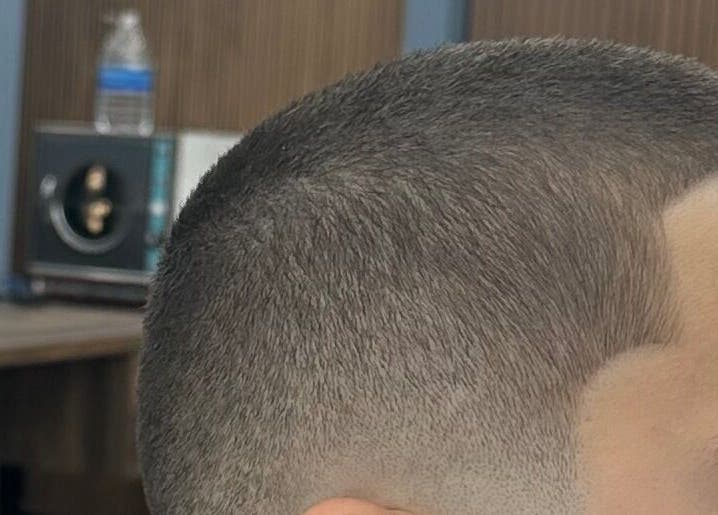 Close-up of a precise buzz cut done at G barbershop, Glendale, California, US.
