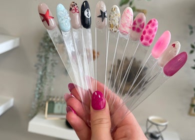Assorted nail designs at Ellie Amanda Nails, Hull, England, GB, showcase artistic flair and vibrant colors.