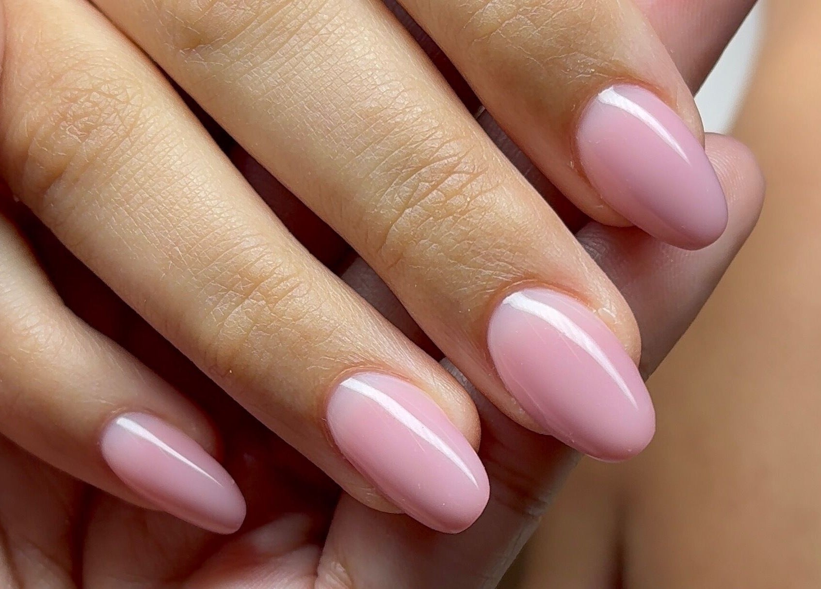 Close-up of polished nails at Serenity Nails, Chang Wat Surat Thani, showcasing exquisite nail care.