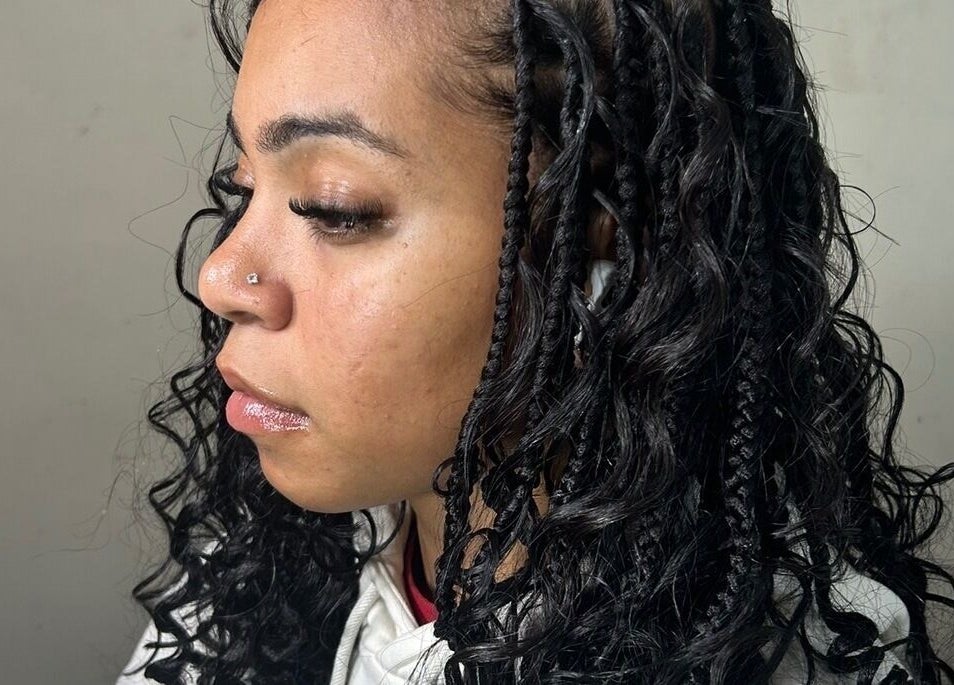 Close-up of intricate braided hairstyle at Olutey, Toronto, Ontario, CA, showcasing expert hair styling.