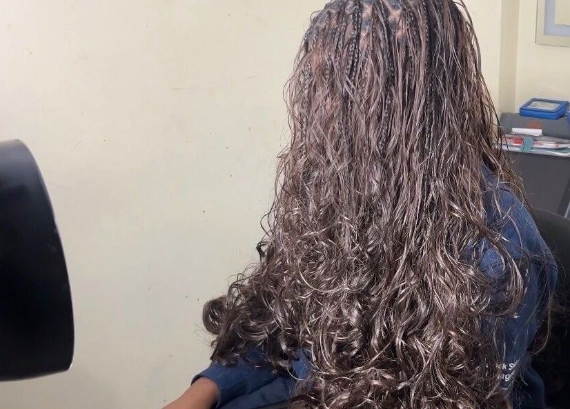 Beautifully styled hair at Olutey in Toronto, Ontario, CA, showcasing expert salon services.