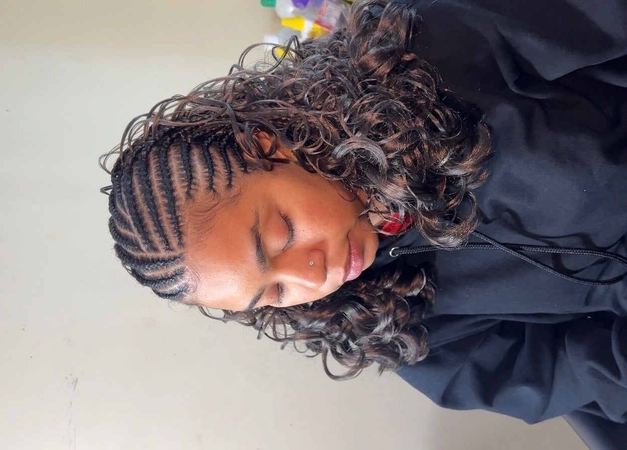 Intricate braided hairstyle with curls at Olutey, Toronto, Ontario, CA, showcasing expert styling.