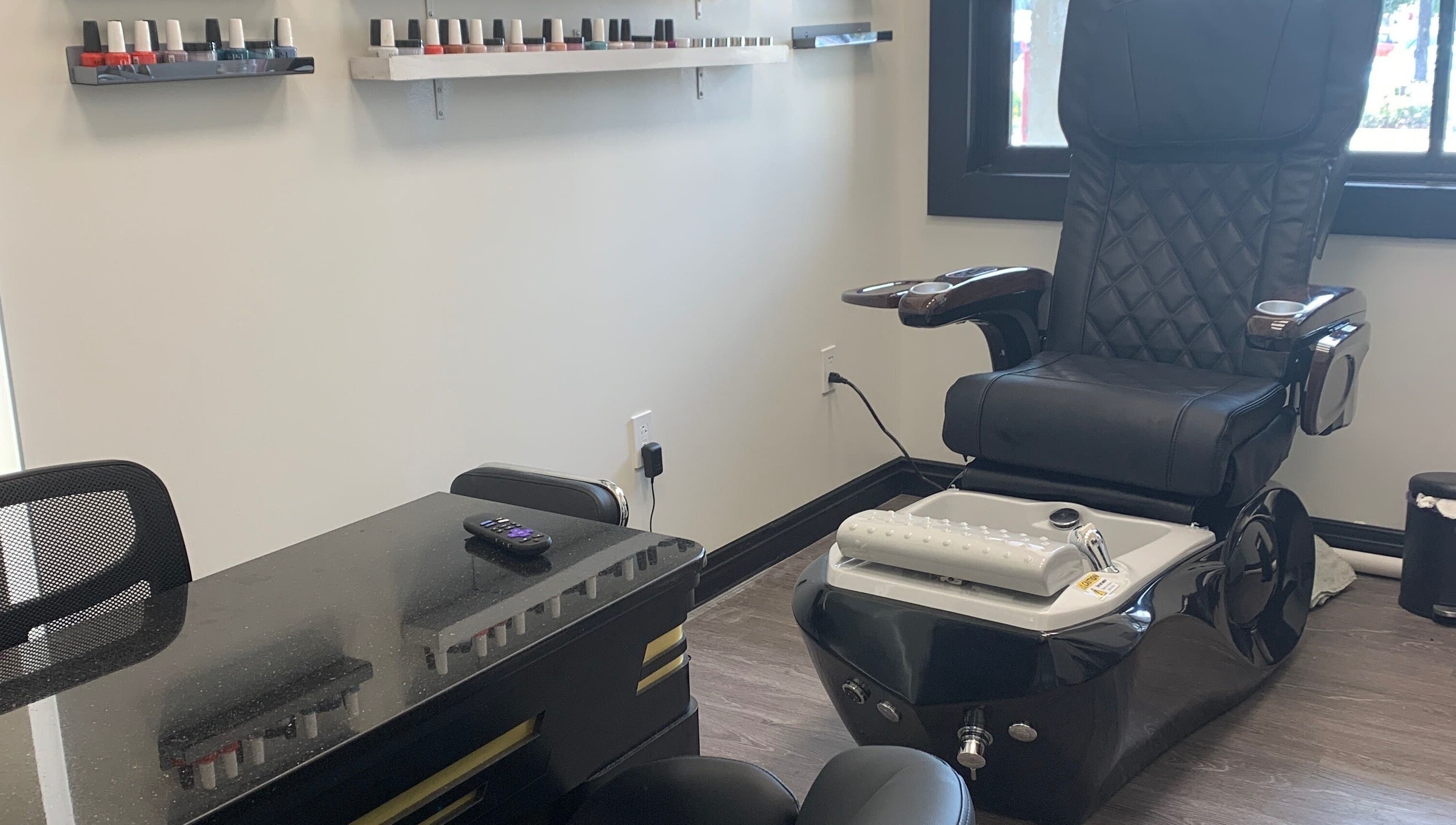 Pedicure chair and nail polish at Coco nail studio in Baton Rouge, Louisiana, US. Modern and relaxing ambiance.