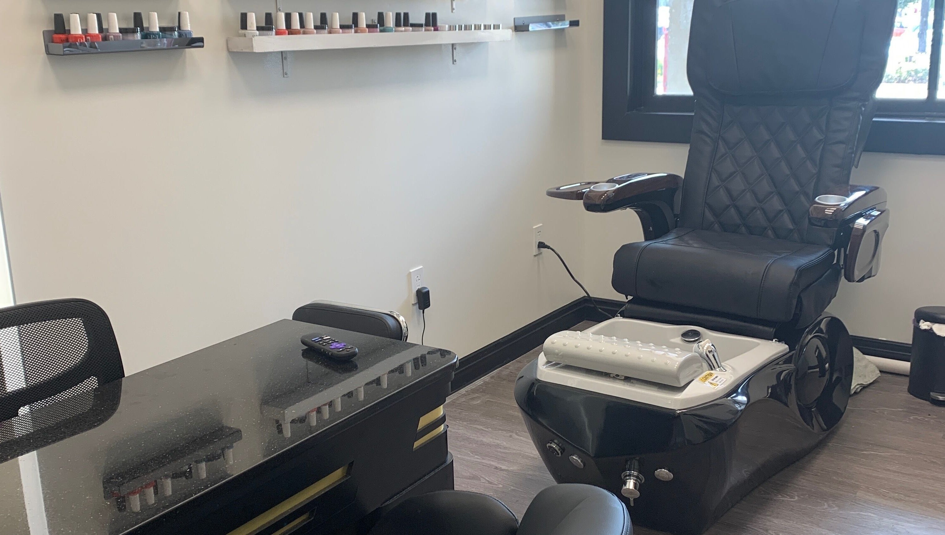 Pedicure chair and nail polish at Coco nail studio in Baton Rouge, Louisiana, US. Modern and relaxing ambiance.