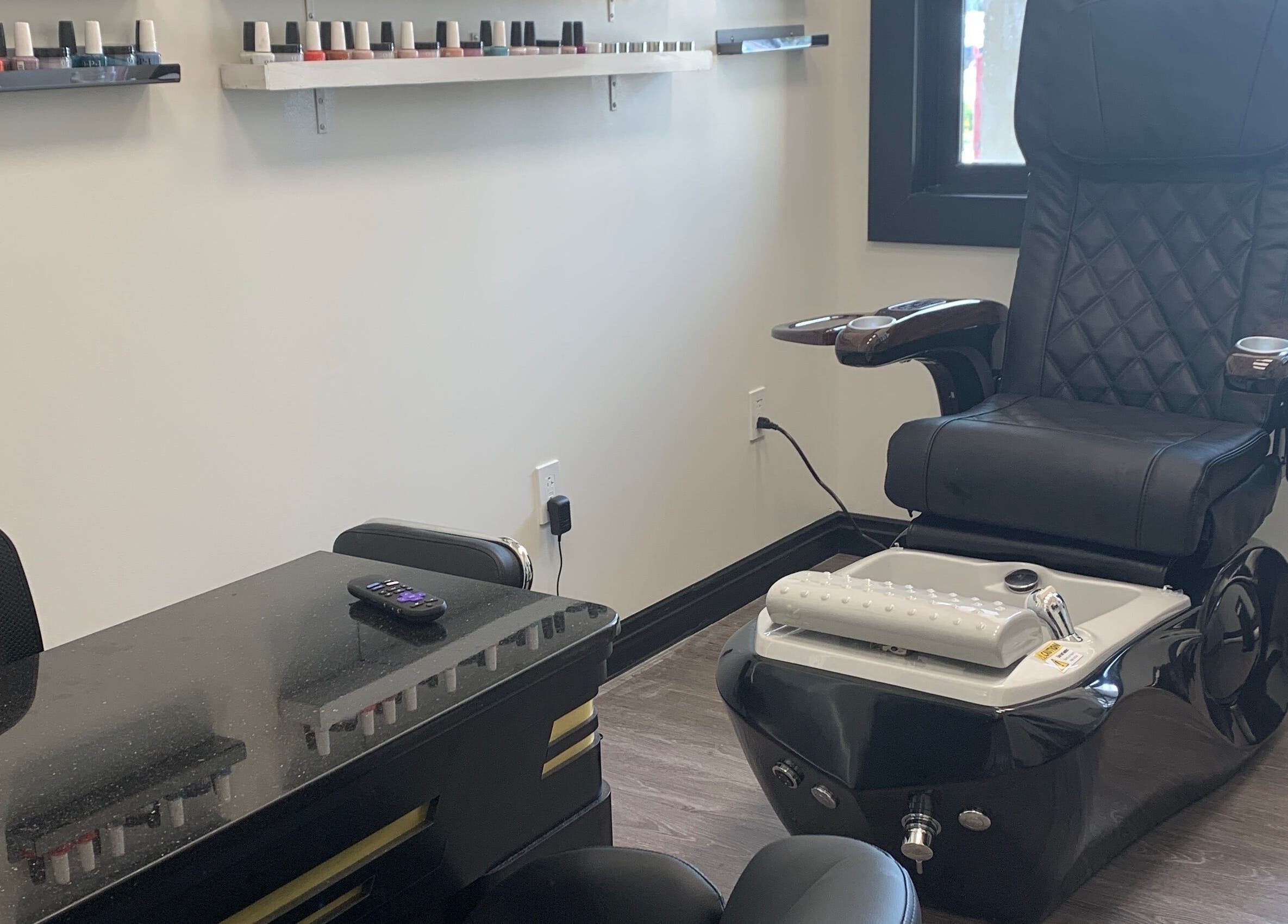 Pedicure chair and nail polish at Coco nail studio in Baton Rouge, Louisiana, US. Modern and relaxing ambiance.