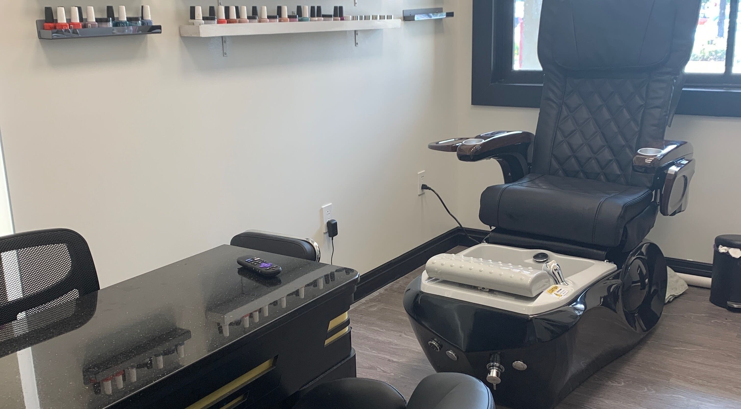 Pedicure chair and nail polish at Coco nail studio in Baton Rouge, Louisiana, US. Modern and relaxing ambiance.