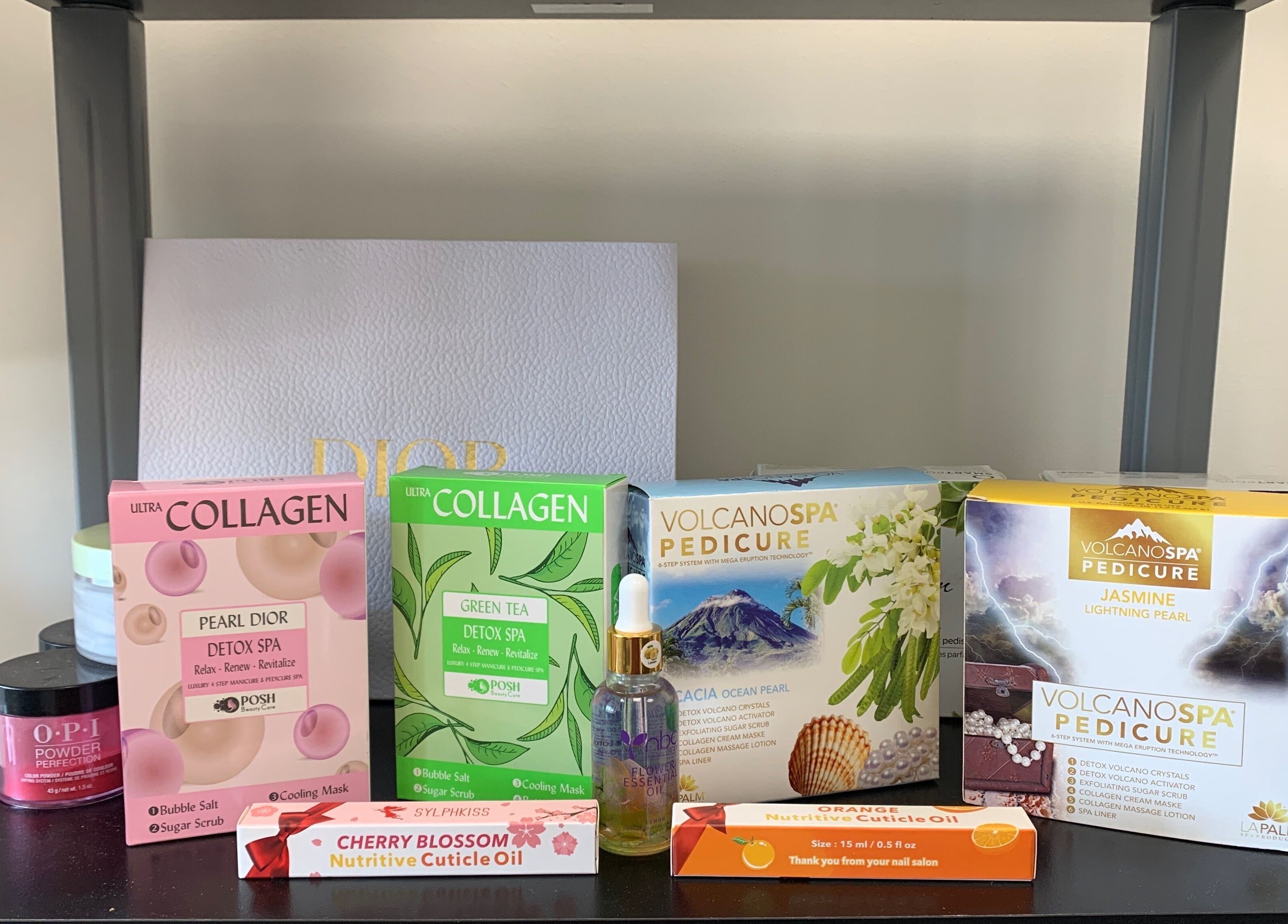 Diverse nail products showcased at Coco nail studio, Baton Rouge, Louisiana, US, featuring spa and collagen items.