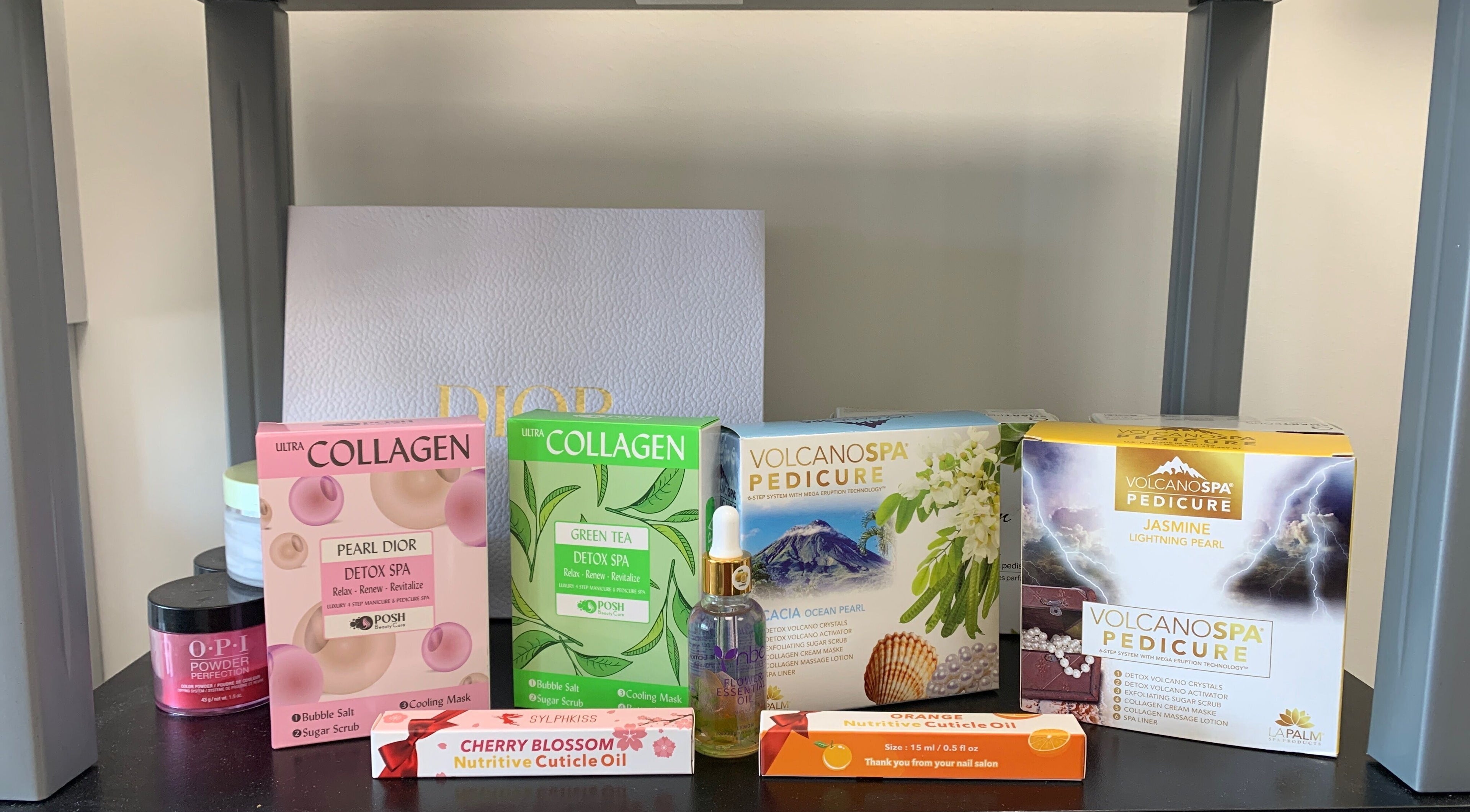 Diverse nail products showcased at Coco nail studio, Baton Rouge, Louisiana, US, featuring spa and collagen items.