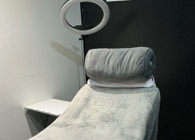 Tranquil treatment room at GB Skin and Laser Salon, Forfar, Scotland, GB with a comfortable spa bed.
