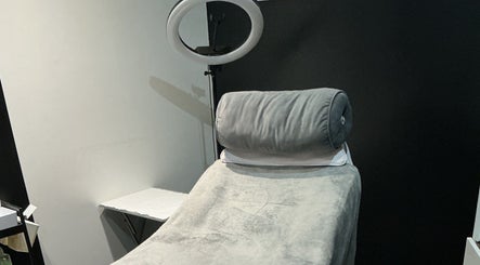 Tranquil treatment room at GB Skin and Laser Salon, Forfar, Scotland, GB with a comfortable spa bed.