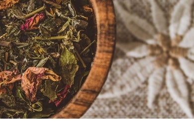 Herbal blend in wooden bowl at KB Herbs, County Galway, IE, exuding natural wellness and organic beauty.