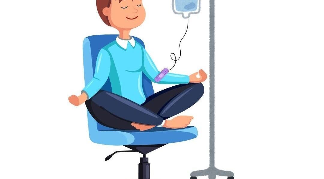 Person meditating during IV therapy at Centered IV Therapy Tyler, TX, in Tyler, Texas, US, ensuring relaxation.