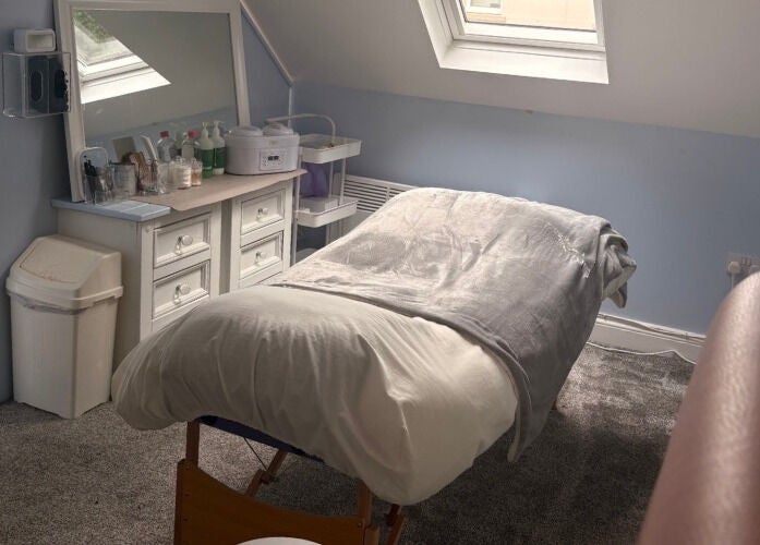Relaxing spa treatment room at Nails and Beauty by Abi in Ramsey, Ramsey, IM with massage bed and soft lighting.