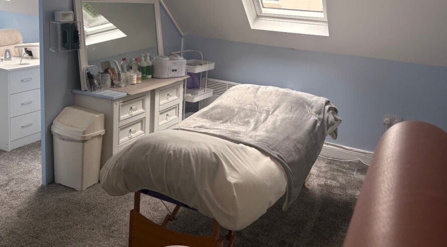 Relaxing spa treatment room at Nails and Beauty by Abi in Ramsey, Ramsey, IM with massage bed and soft lighting.