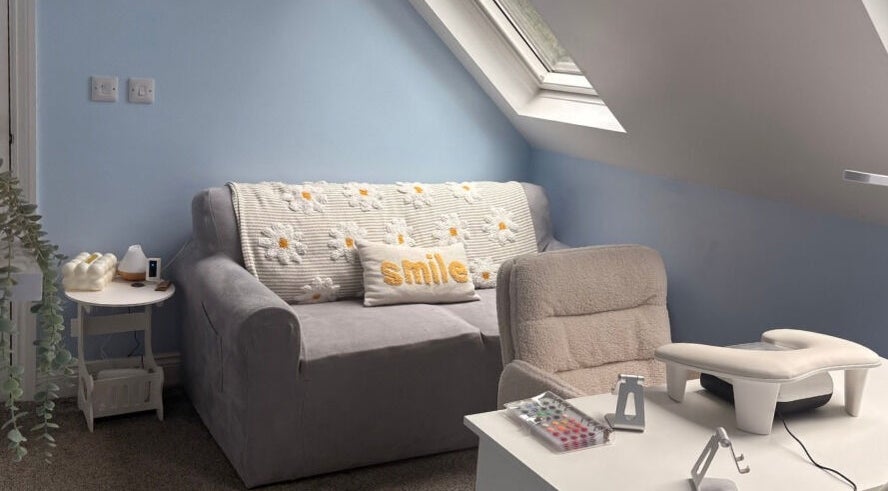 Comfortable nail treatment area at Nails and Beauty by Abi, Ramsey, Ramsey, IM with sofa and manicure setup.