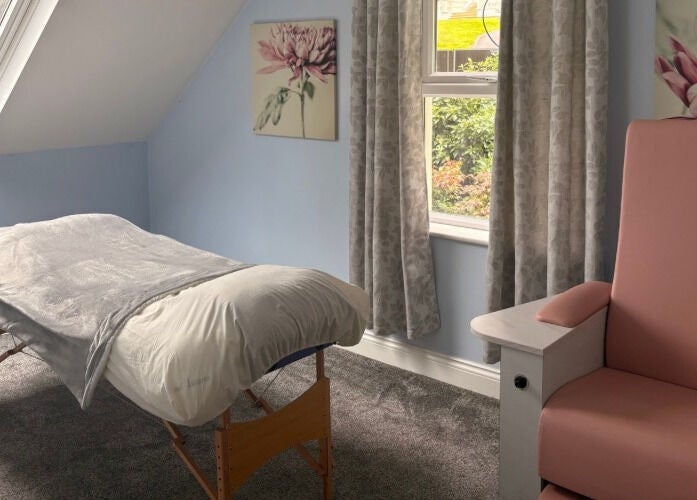 Massage room at Nails and Beauty by Abi in Ramsey, Ramsey, IM with serene decor and comfortable seating.