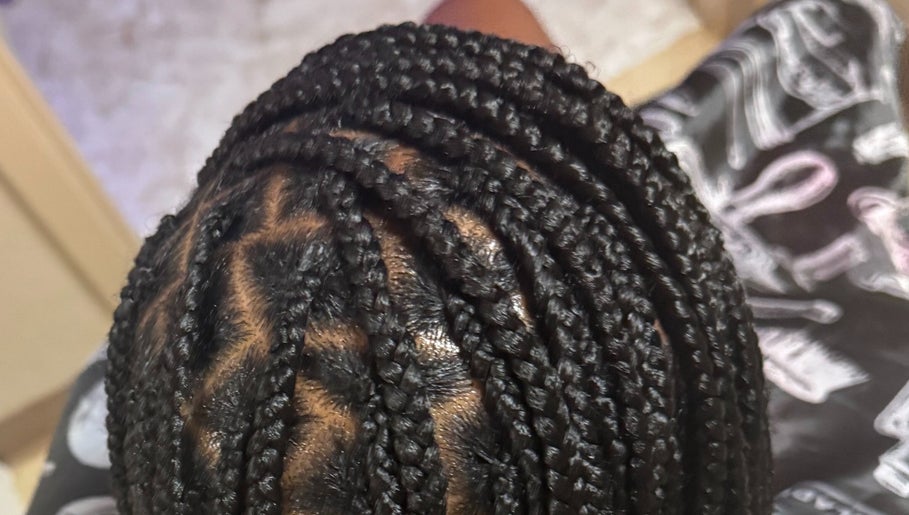 Intricate braids styled at SlayedbyGracy in Wahiawa, Hawaii, US, showcasing expert hair artistry.