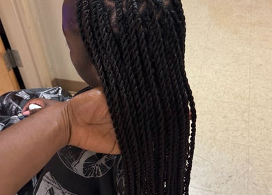 Intricate braids styled at SlayedbyGracy in Wahiawa, Hawaii, US, showcasing skilled hairstyling.