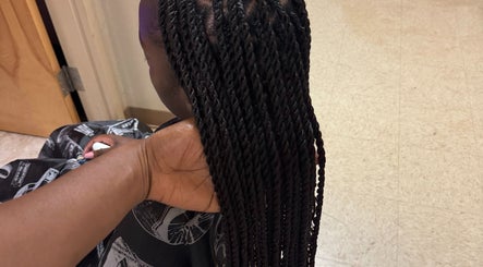 Intricate braids styled at SlayedbyGracy in Wahiawa, Hawaii, US, showcasing skilled hairstyling.