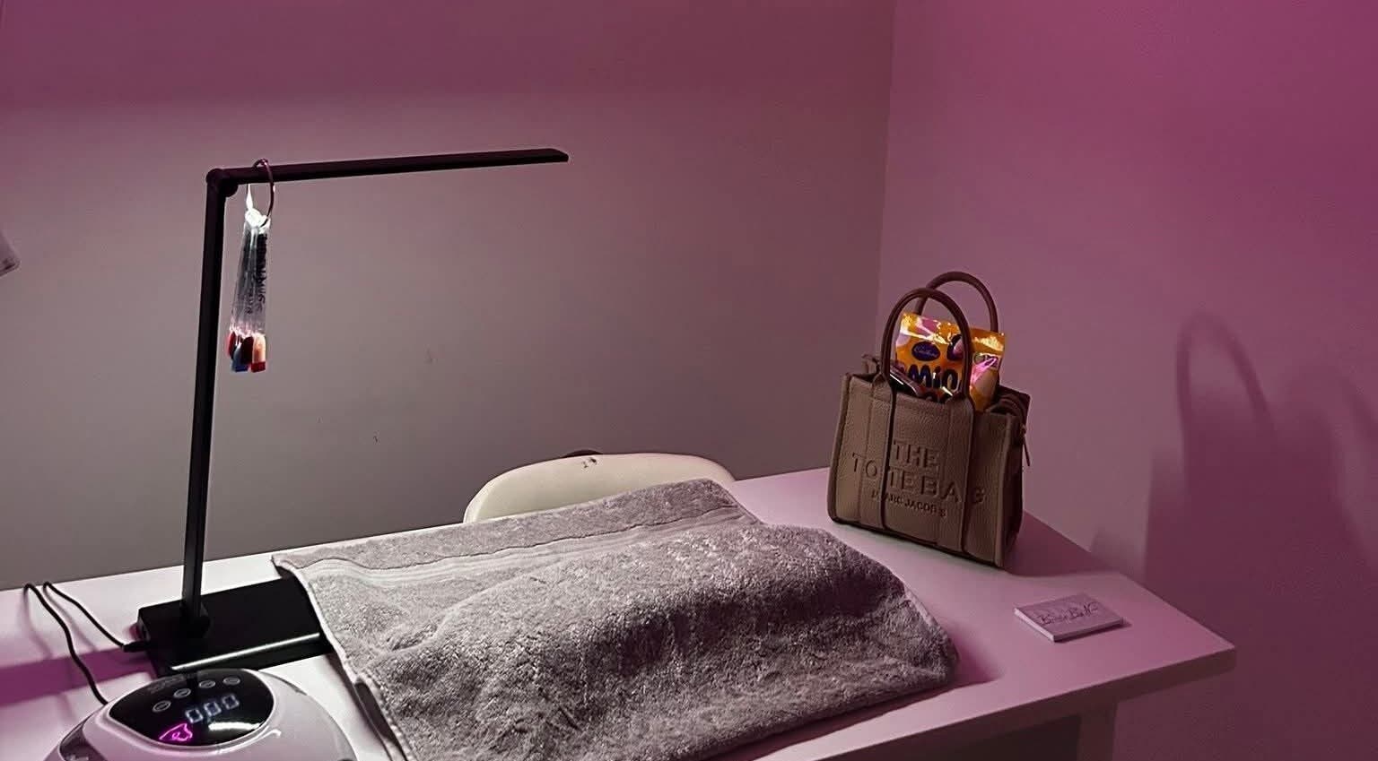 Cozy nail station at Nails by Lu, Lusaka, Lusaka Province, ZM with stylish decor and modern equipment.