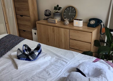 Relaxing massage room at Krist's Massage Studio (Private), Darlinghurst, New South Wales, AU with cozy decor.