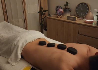 Relaxing stone therapy at Krist's Massage Studio (Private), Darlinghurst, New South Wales, AU, enhancing tranquility.