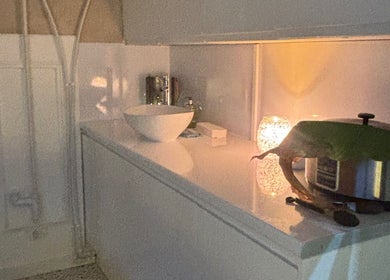 Calming candle-lit corner at Kbs Holistic Treatments And Colonic Hydrotherapy, Tiverton, England, GB.