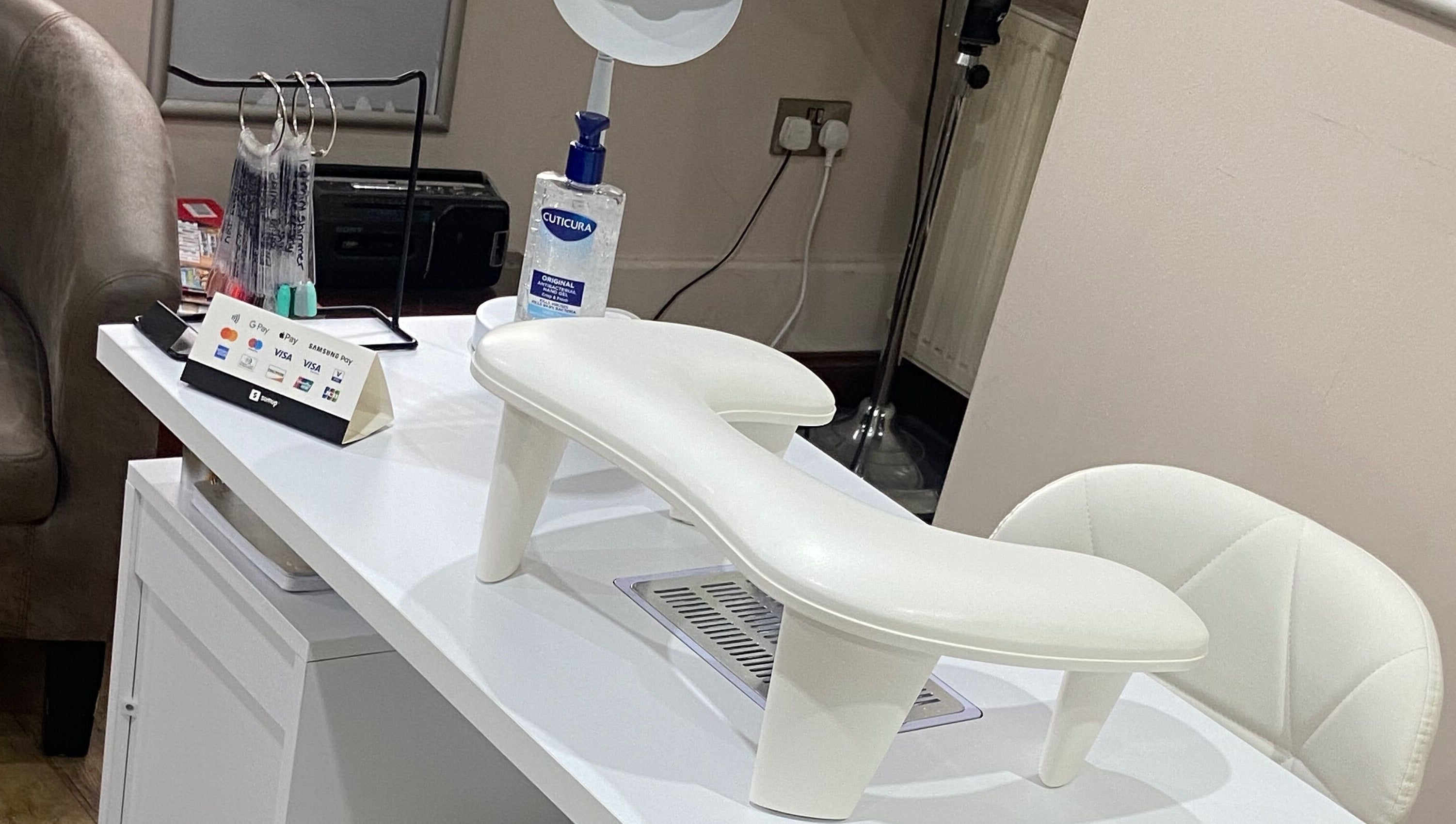 Sleek manicure station at Nails By Ava, Bridgwater, England, GB displaying tools and products.