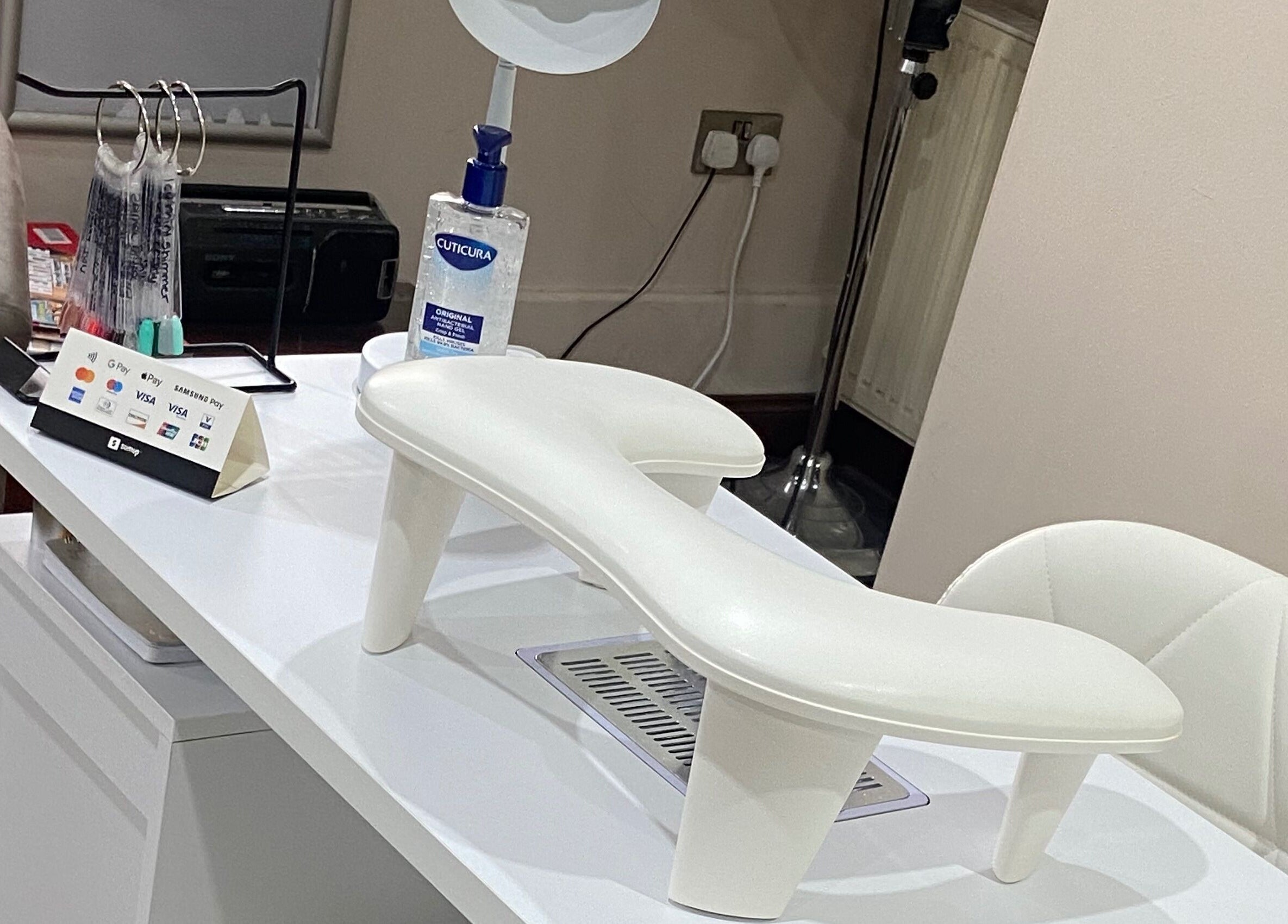 Sleek manicure station at Nails By Ava, Bridgwater, England, GB displaying tools and products.